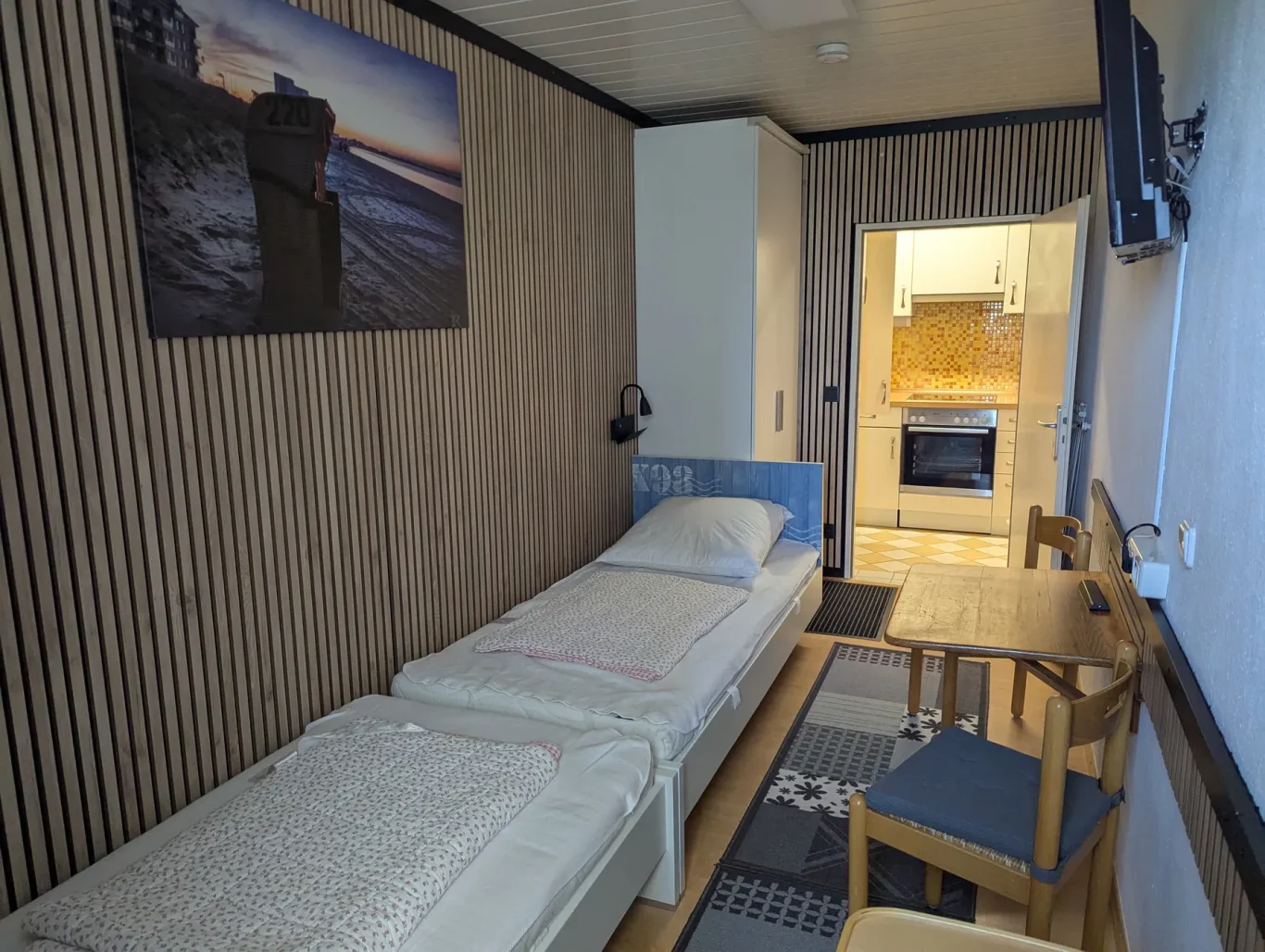 sep. Schlafzimmer Schlafbereich mit Einzelbetten in Ferienwohnung auf Fehmarn