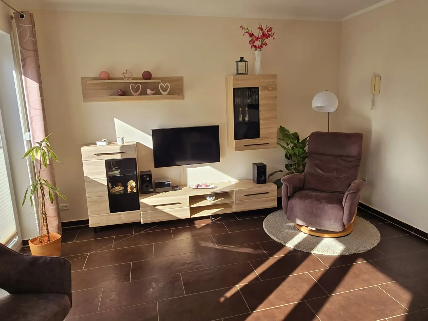 Wohnzimmer Wohnzimmer mit TV in Ferienwohnung auf Fehmarn