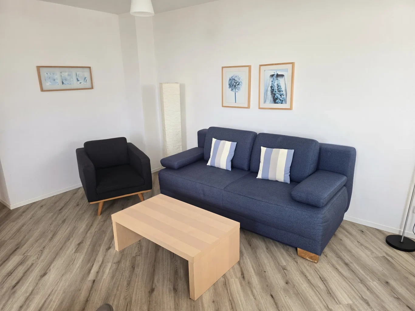 Wohnzimmer Wohnzimmer mit Sofa in Ferienwohnung am Südstrand Fehmarn