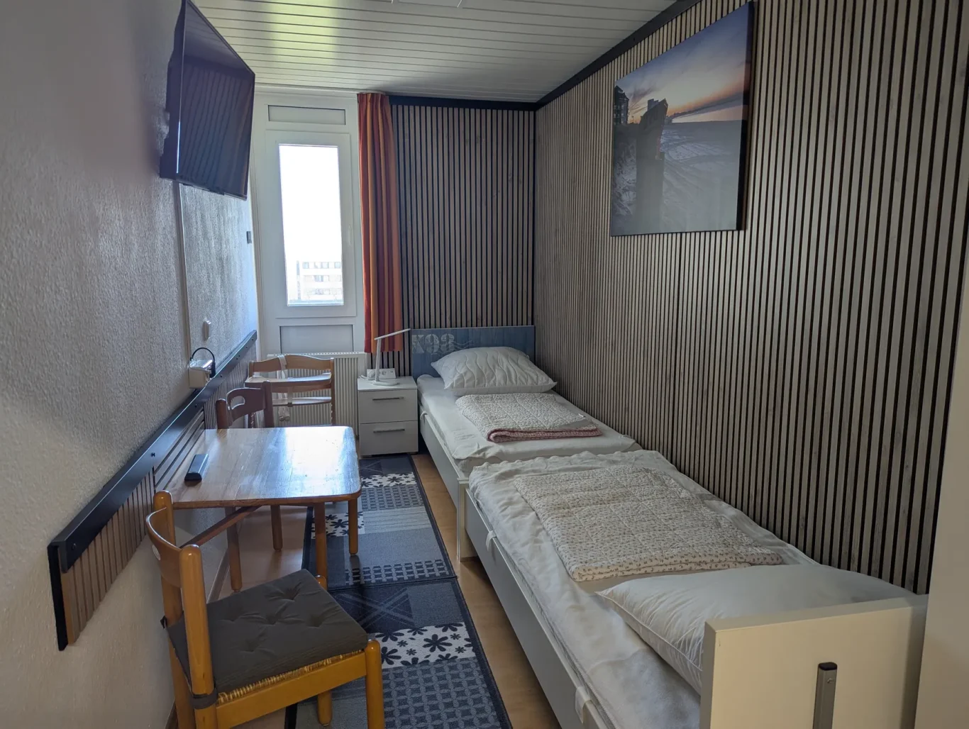 sep. Schlafzimmer Schlafbereich mit Einzelbetten in Ferienwohnung auf Fehmarn