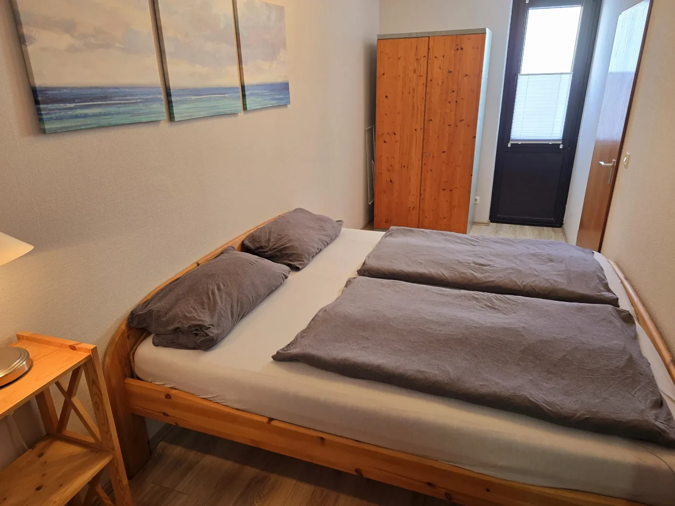 sep. Schlafzimmer Schlafzimmer mit Doppelbett in Ferienwohnung am Südstrand Fehmarn