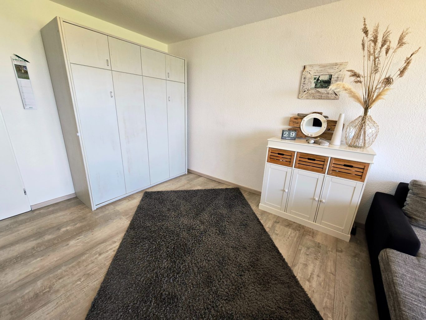 Wohn-/Schlafzimmer Schrankbett Wohn- und Schlafbereich mit Schrankbett und maritimer Einrichtung