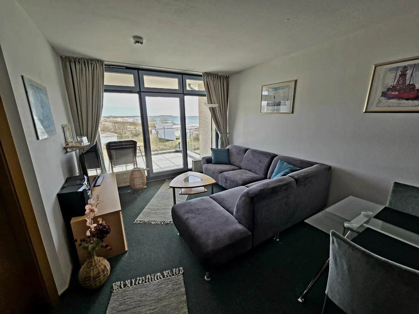 Wohnzimmer Wohnzimmer mit Ostseeblick in Ferienwohnung auf Fehmarn