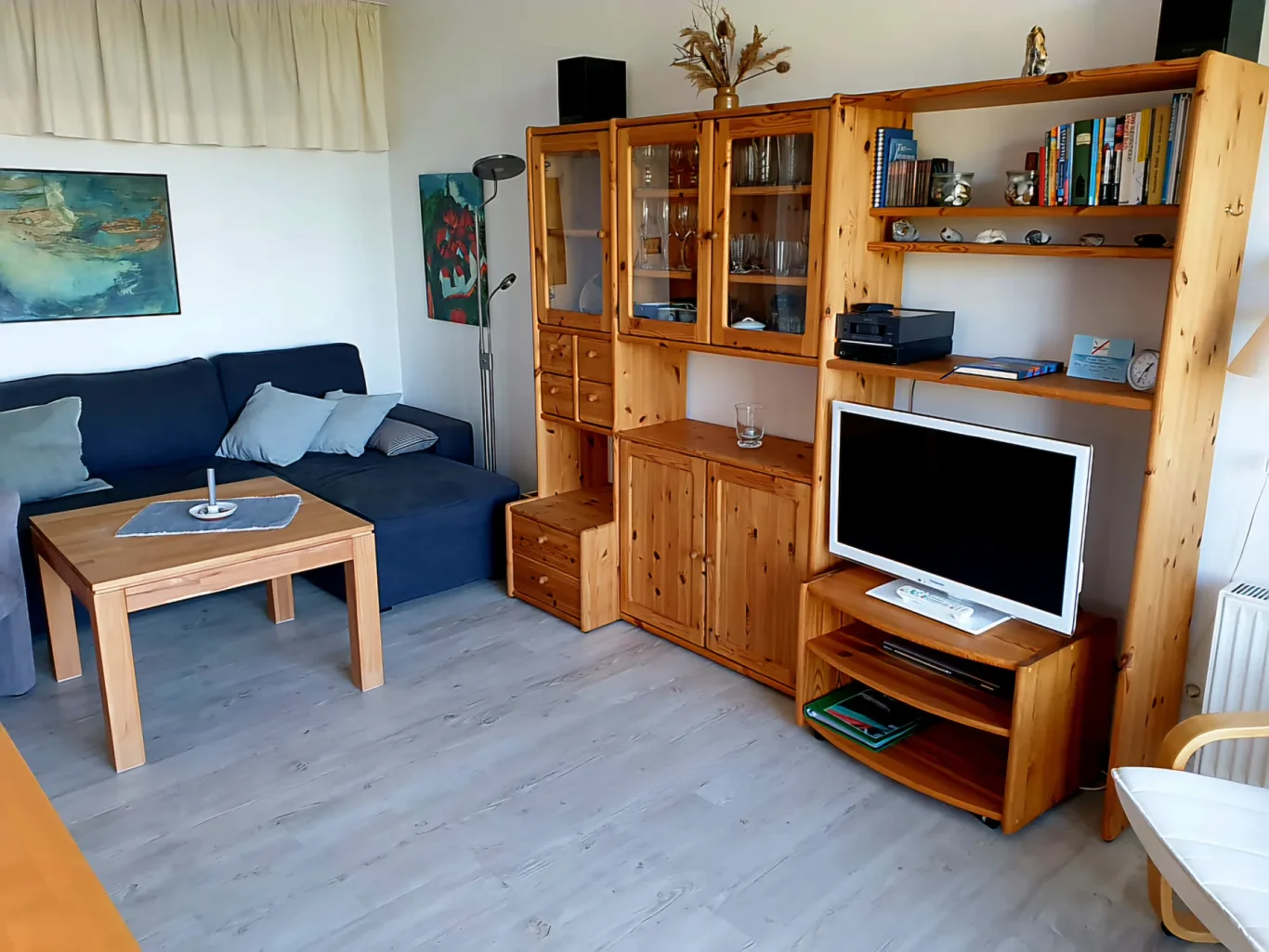 Wohnzimmer Wohnzimmer mit TV in Ferienwohnung auf Fehmarn