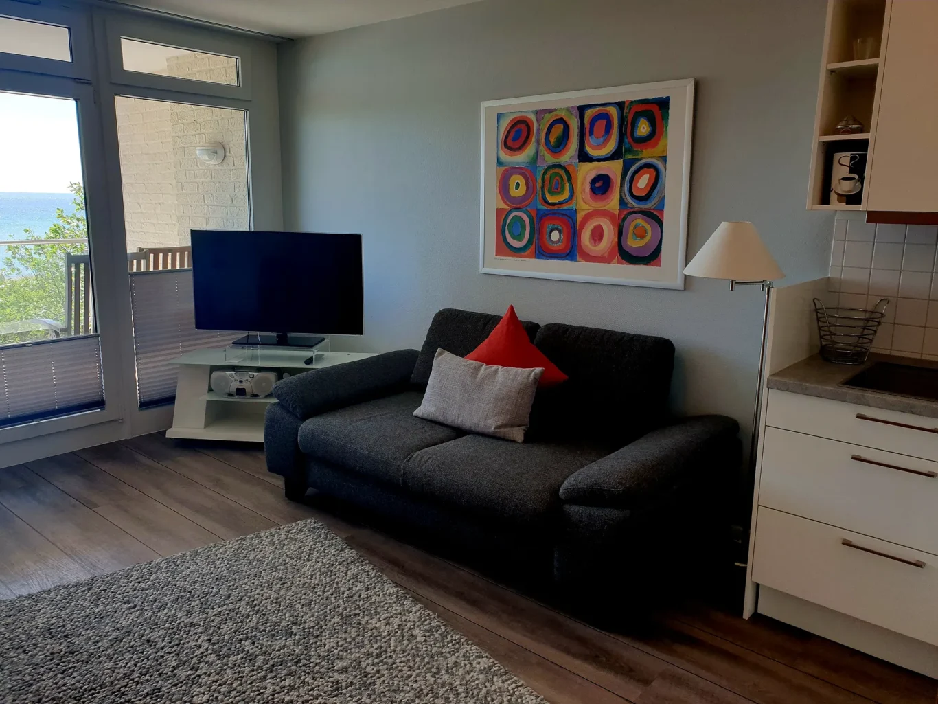 Wohn-/Schlafzimmer Wohnzimmer mit Sofa auf Fehmarn